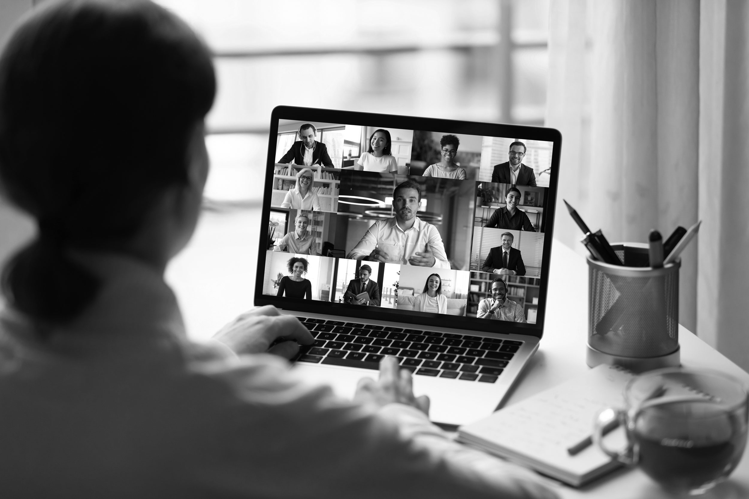 Employer in online meeting with flexible, remote workforce